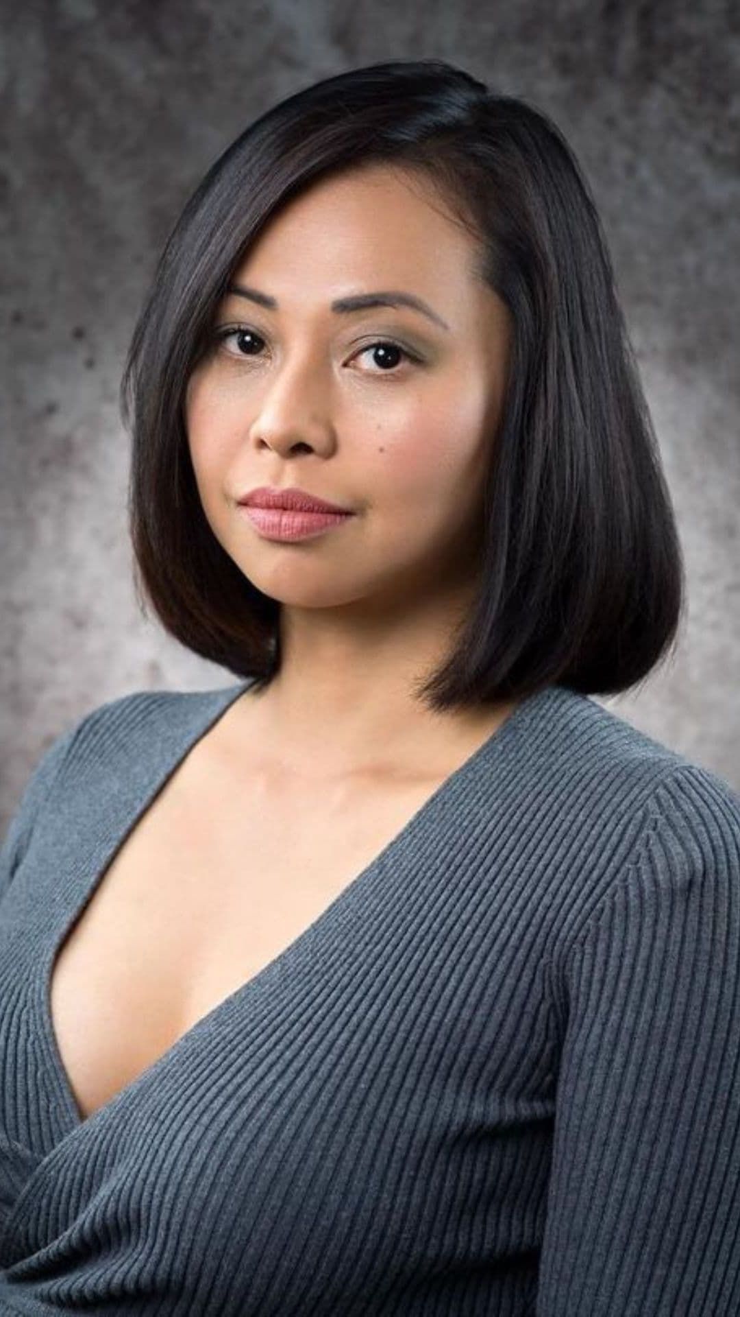 A woman modelling a classic bob cut.